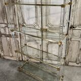 Plexiglass shelf by Pierre Vandel in Hollywood Regency style circa 1970.