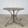 Beautiful 19th-century iron table in the Arras model.