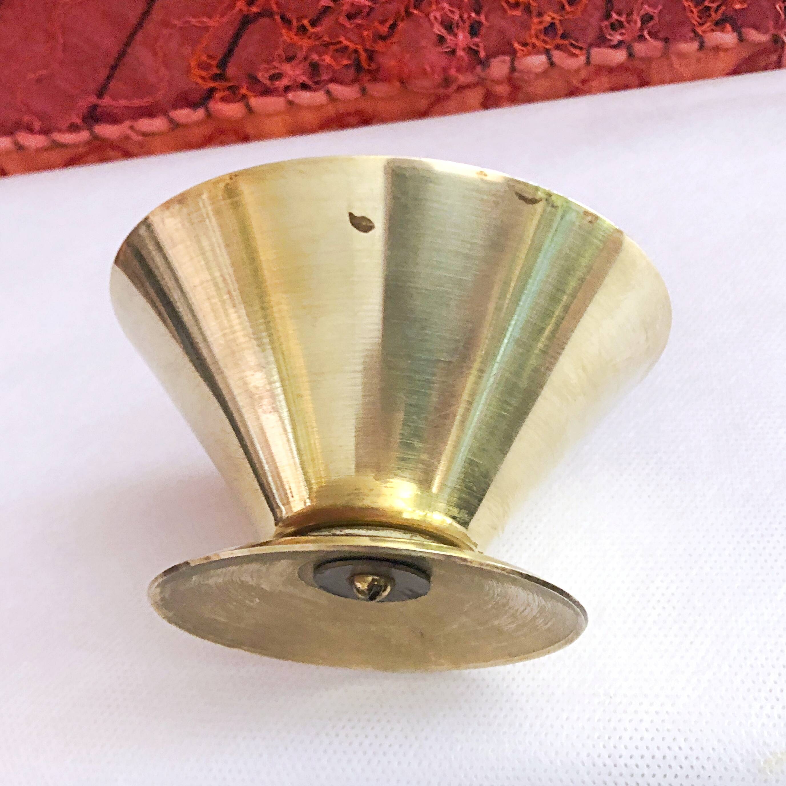 Table candle holder in golden brass