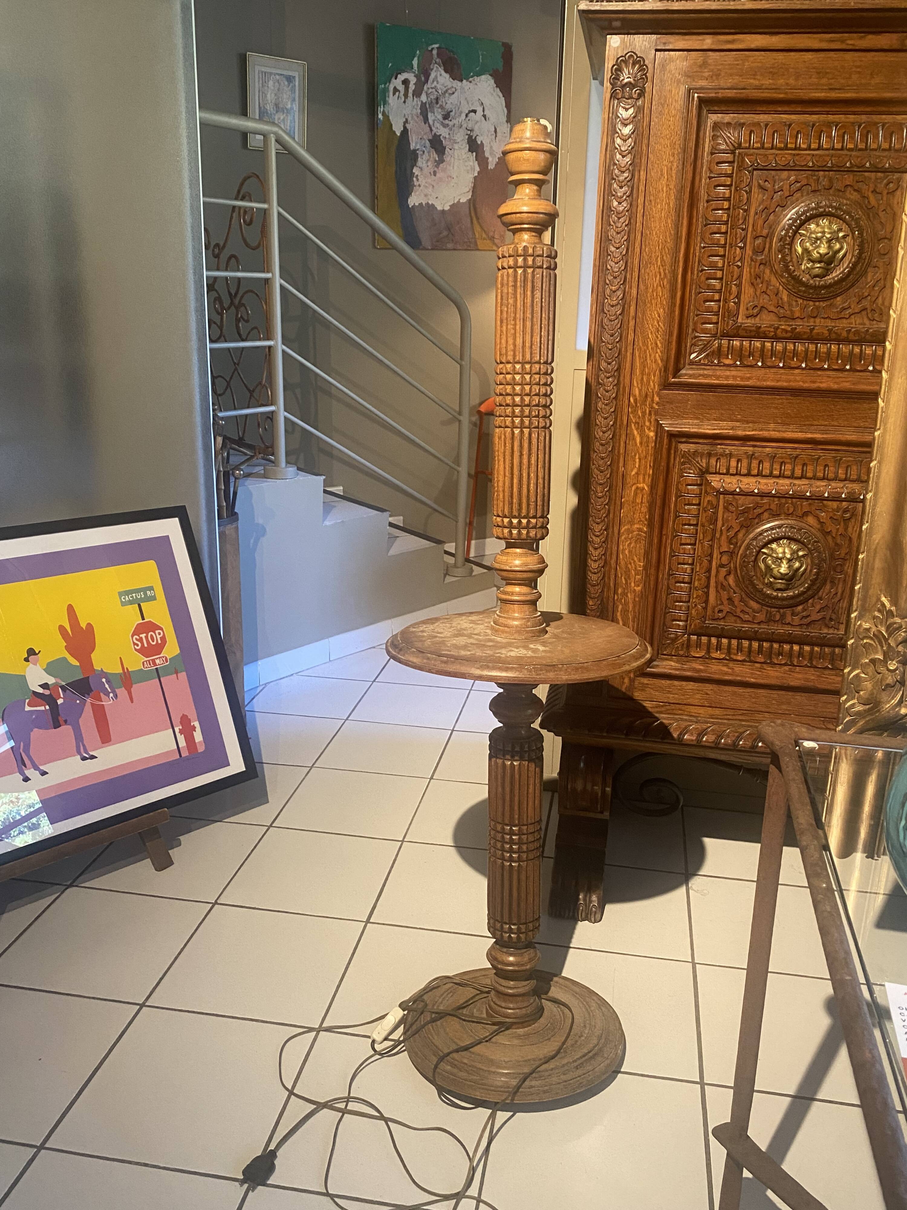 carved wooden floor lamp