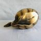 Empty-pocket "Swan" in brass from the 70s