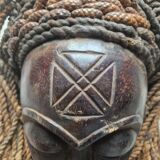 Chokwe Mwana Pwo mask in carved wood with a dark patina and rope hair