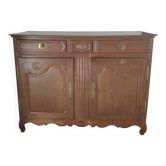 Two low antique buffets in carved solid oak with rosettes.