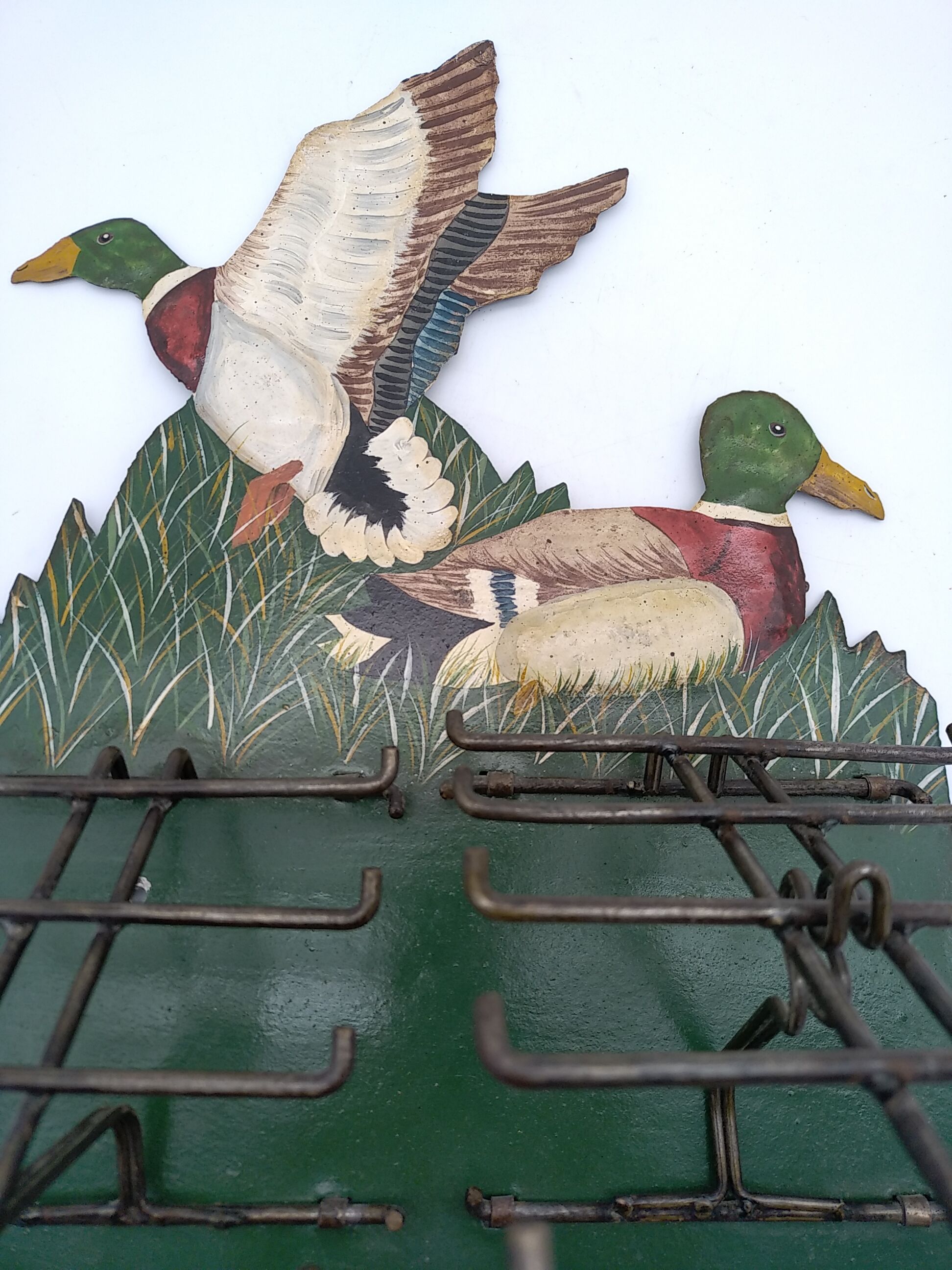 Metal wall tie door with duck decoration. 50s .