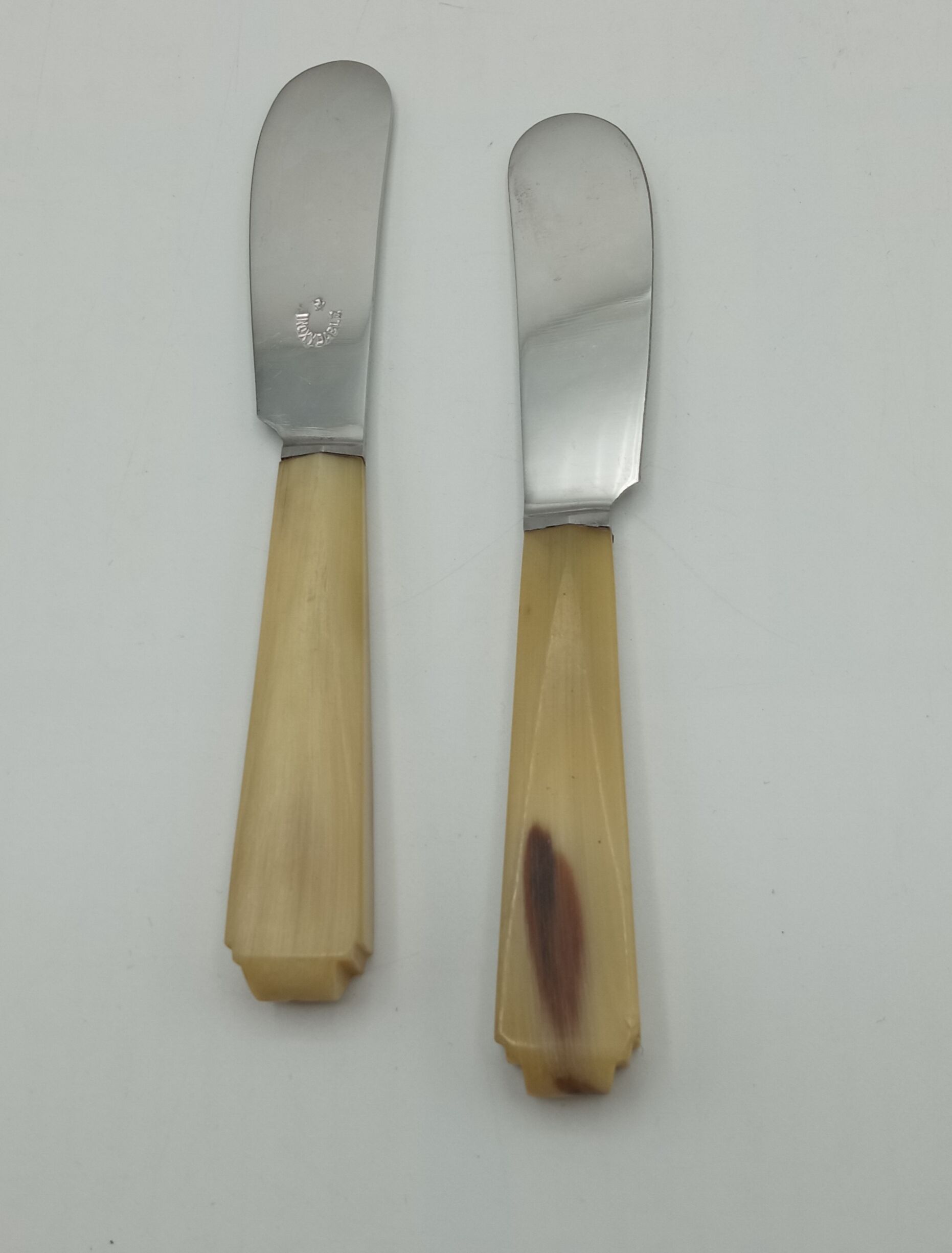 Twelve vintage butter knives
