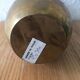 Chiseled brass vase