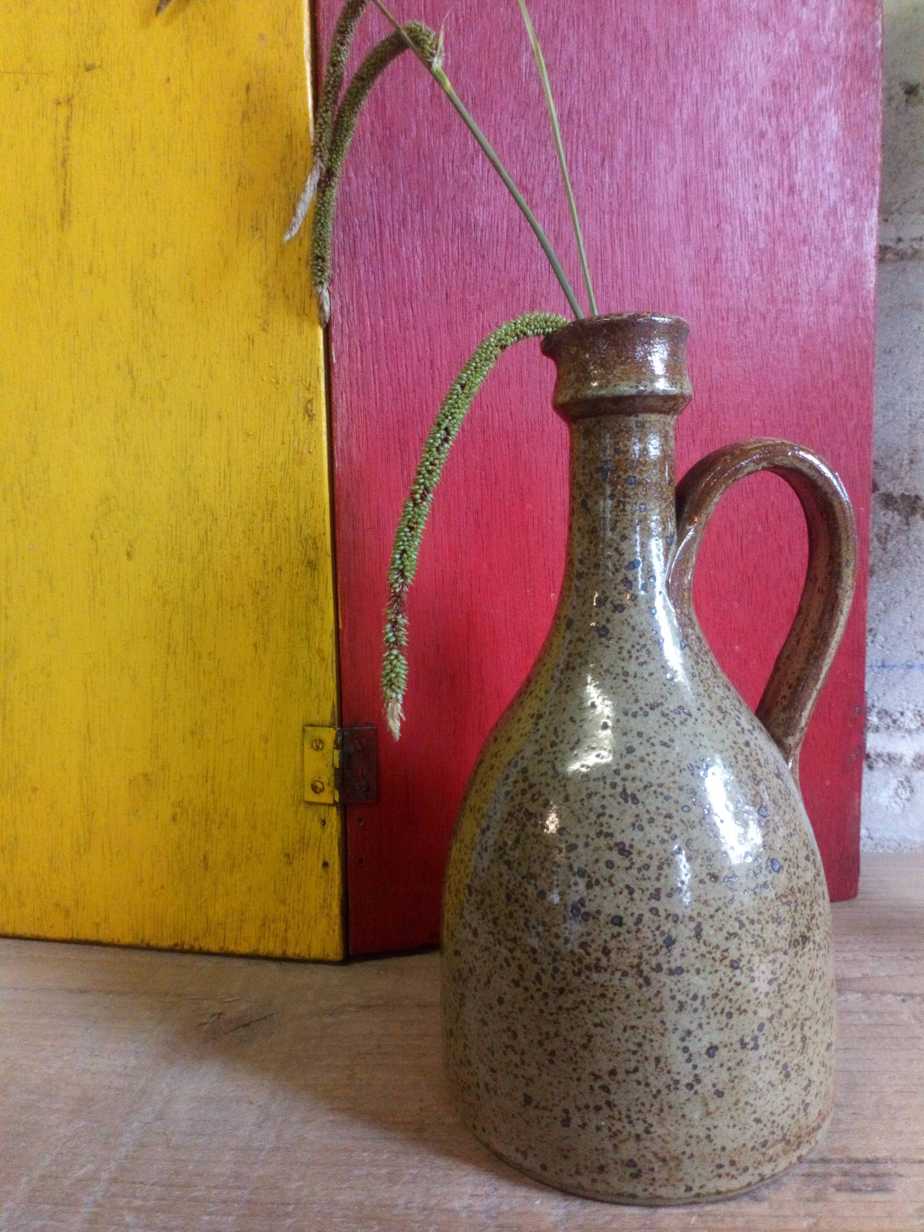 Vintage pottery in sandstone with handles and small beak