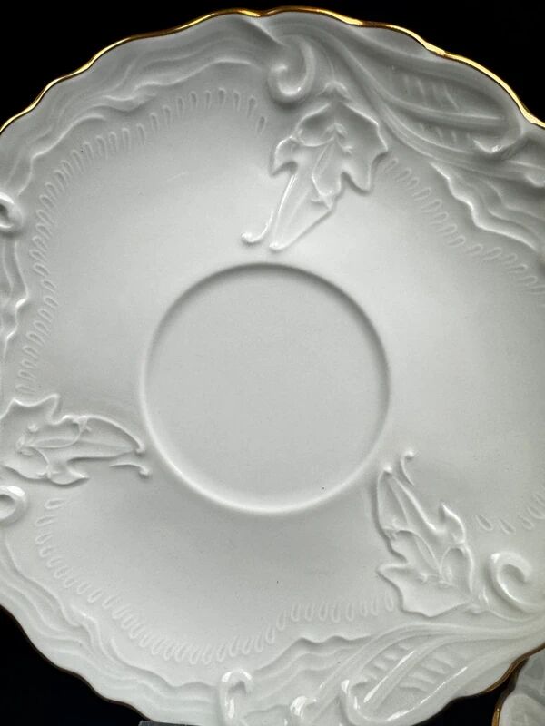 Tharaud Limoges white porcelain cups and saucers with gold relief