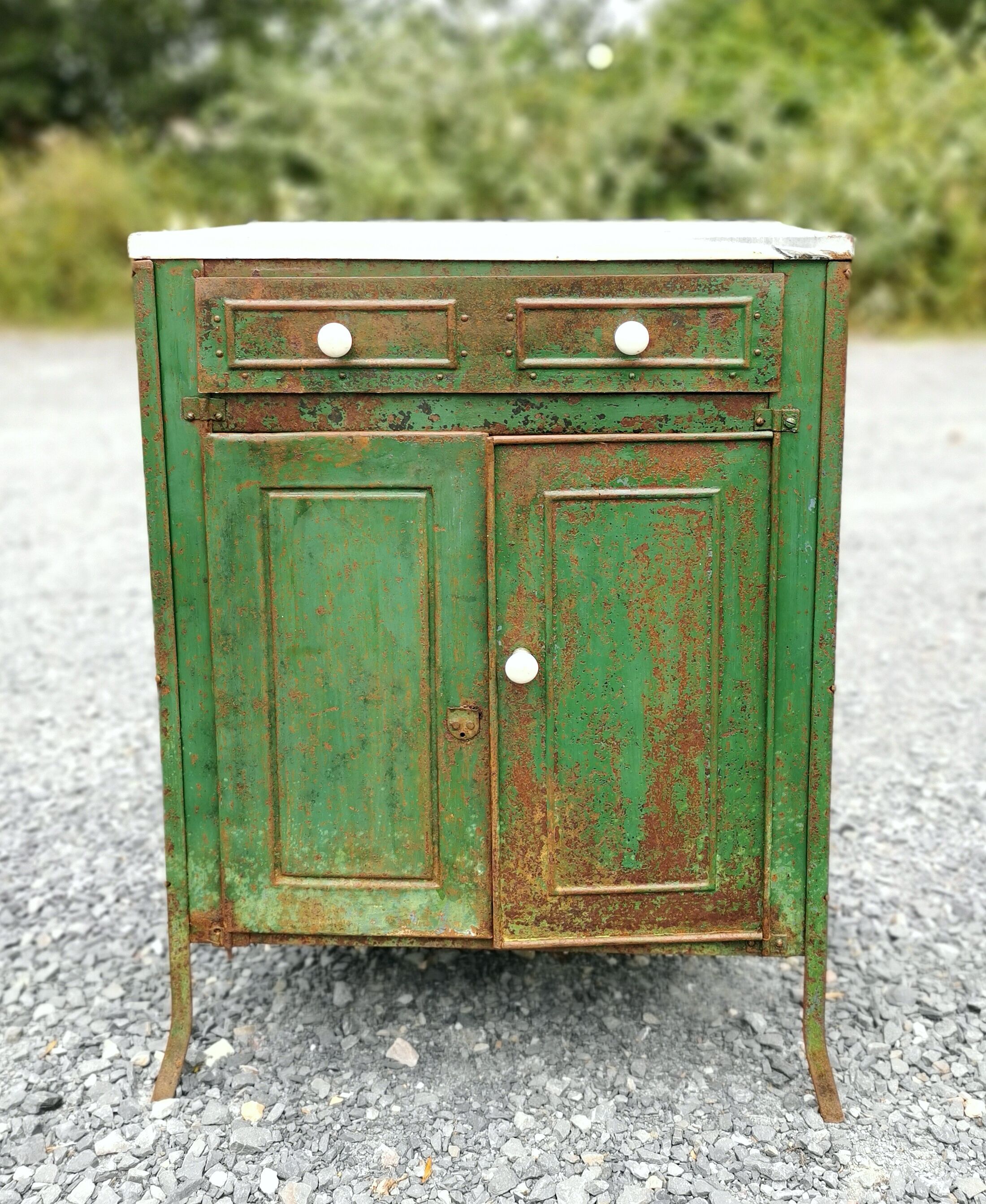 Patinated metal furniture