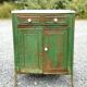 Patinated metal furniture
