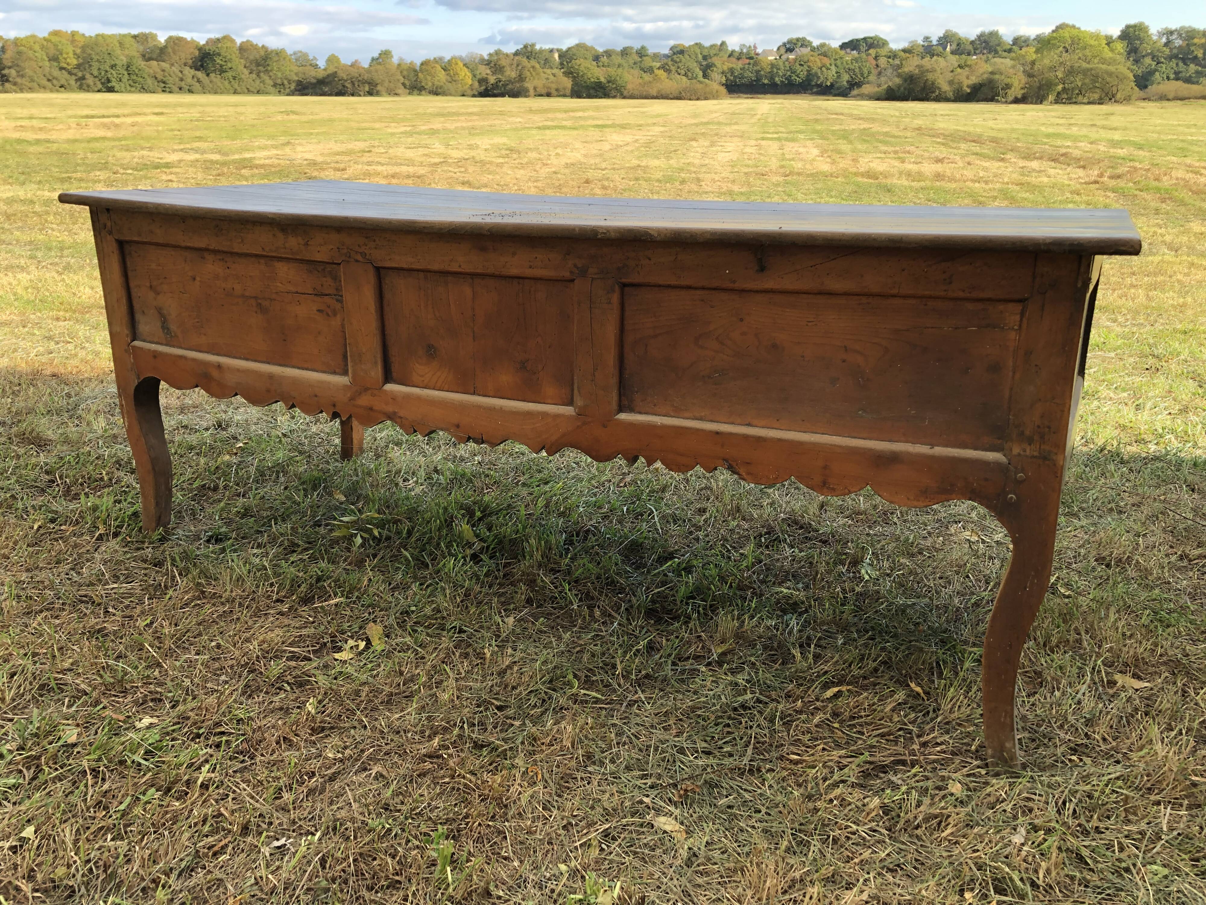 Antique Louis XV paneled table with 3 front drawers in solid cherry wood