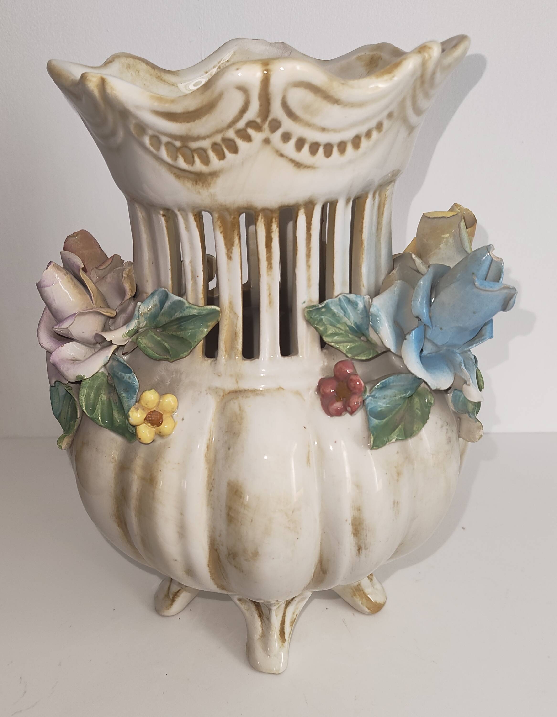 Antique ceramic pot-pourri vase with relief floral decoration.