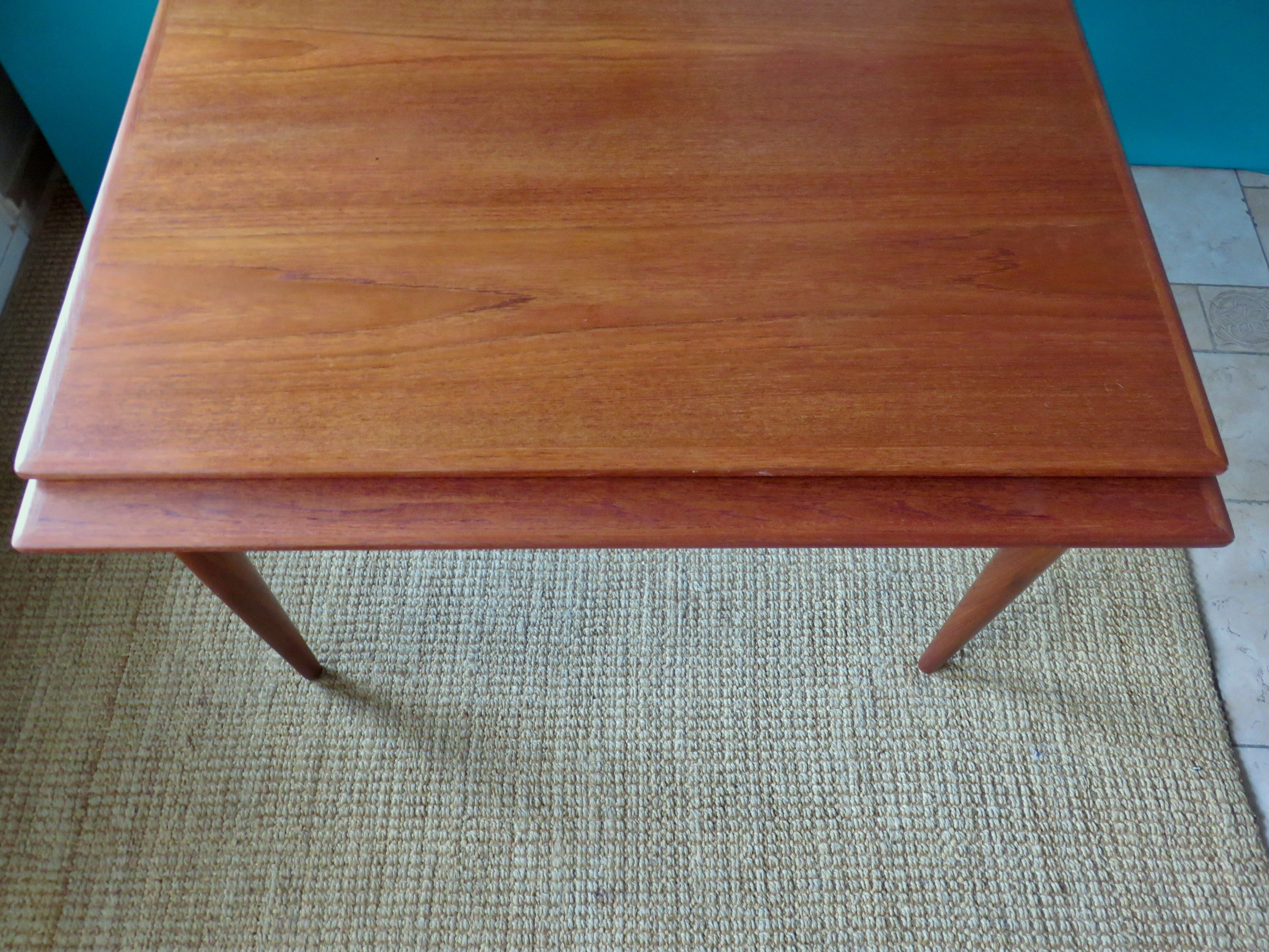 Square table in teak with extensions. Denmark 1960