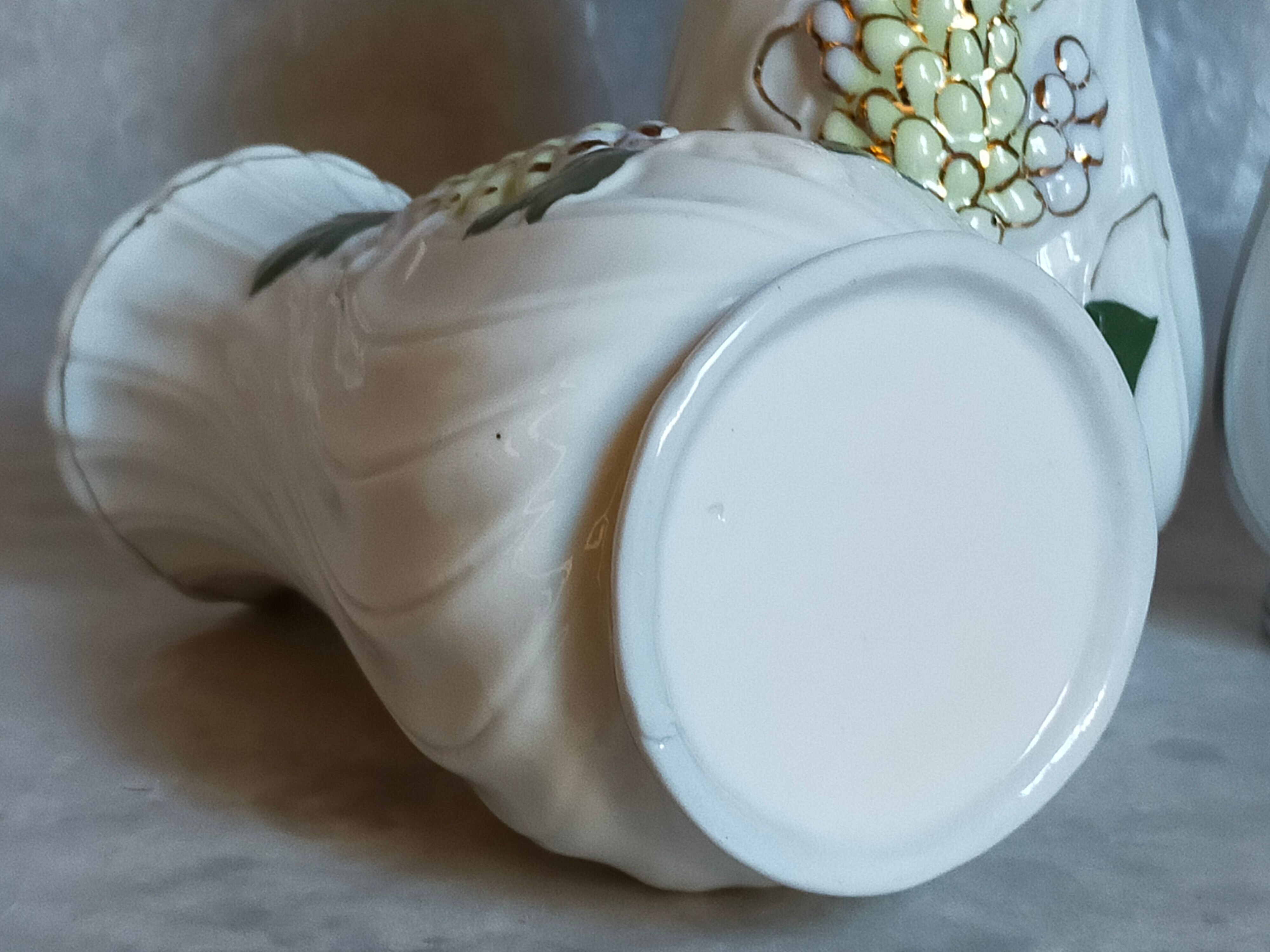 Three ancient lilac slurry vases