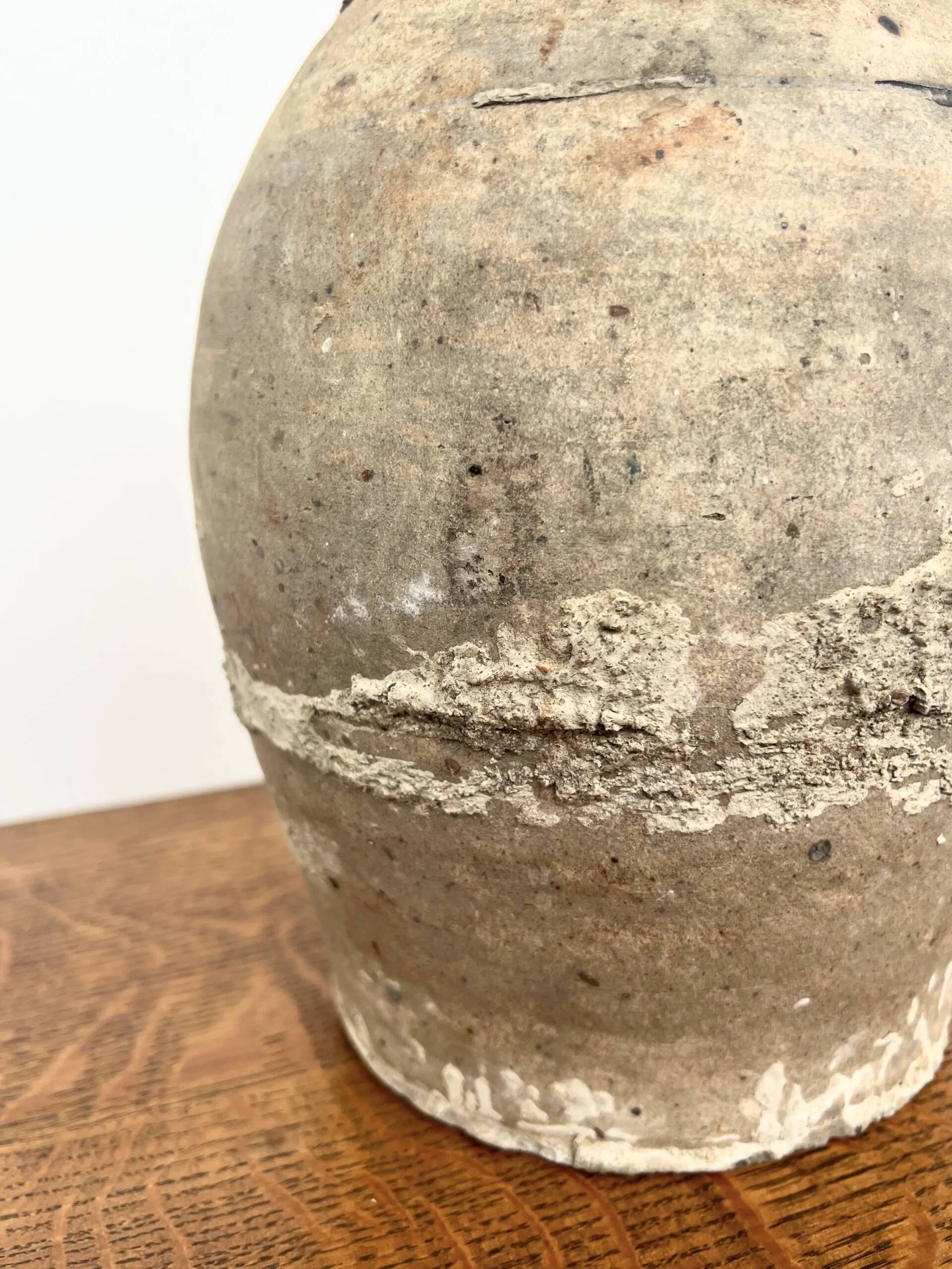 Antique raw terracotta jar
