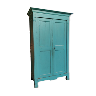Antique patinated two-door cabinet