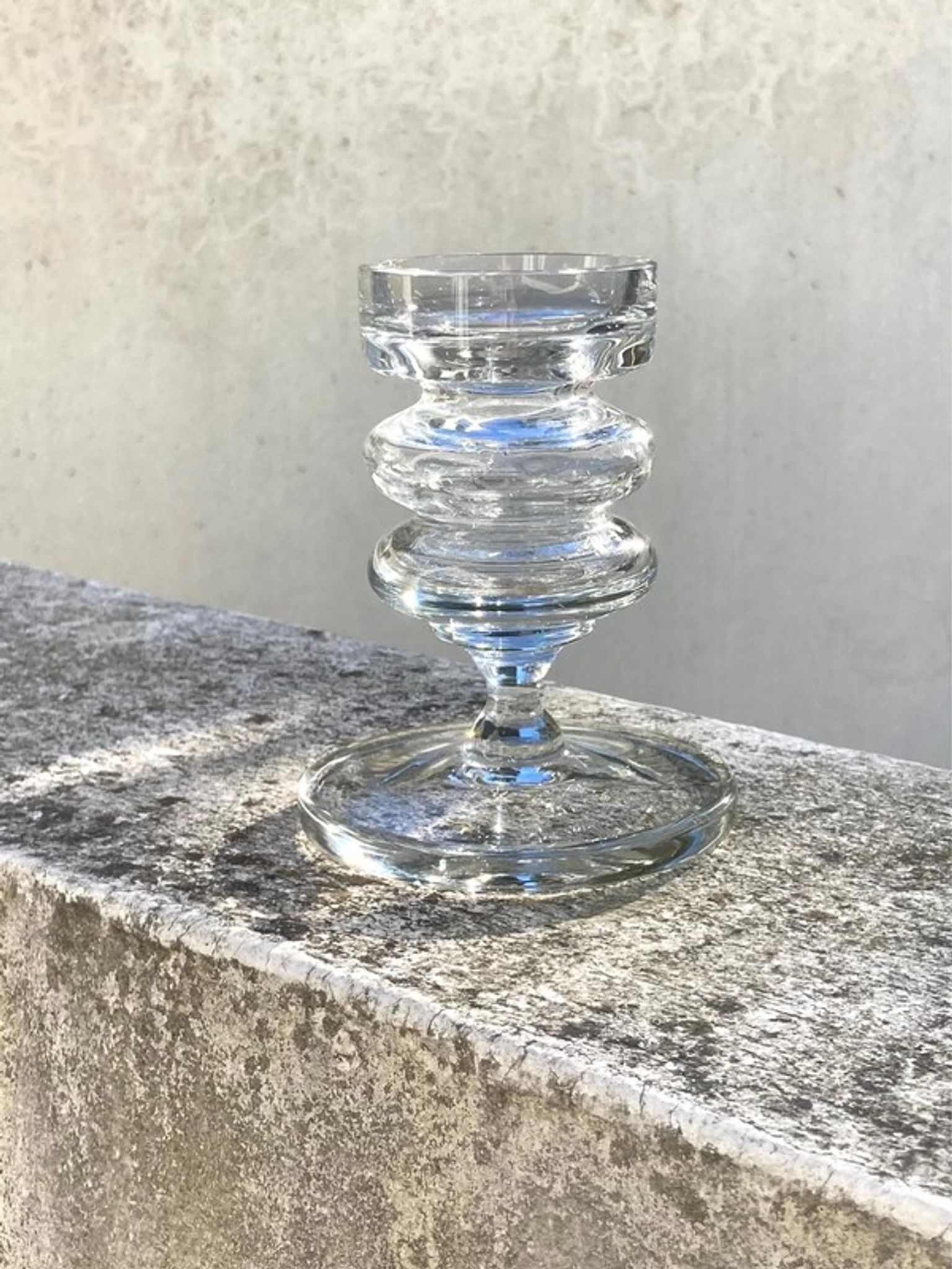 The glass candle holder