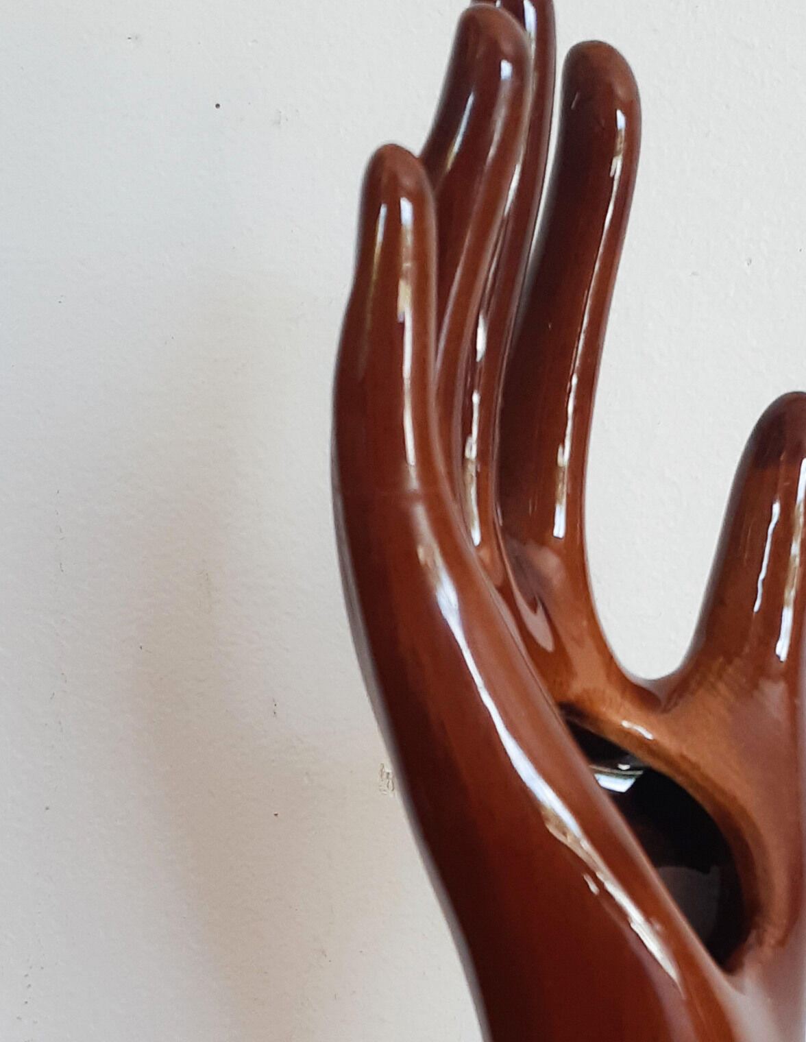 Hand wears brown jewelry , ring, soliflore , vintage French , 50s