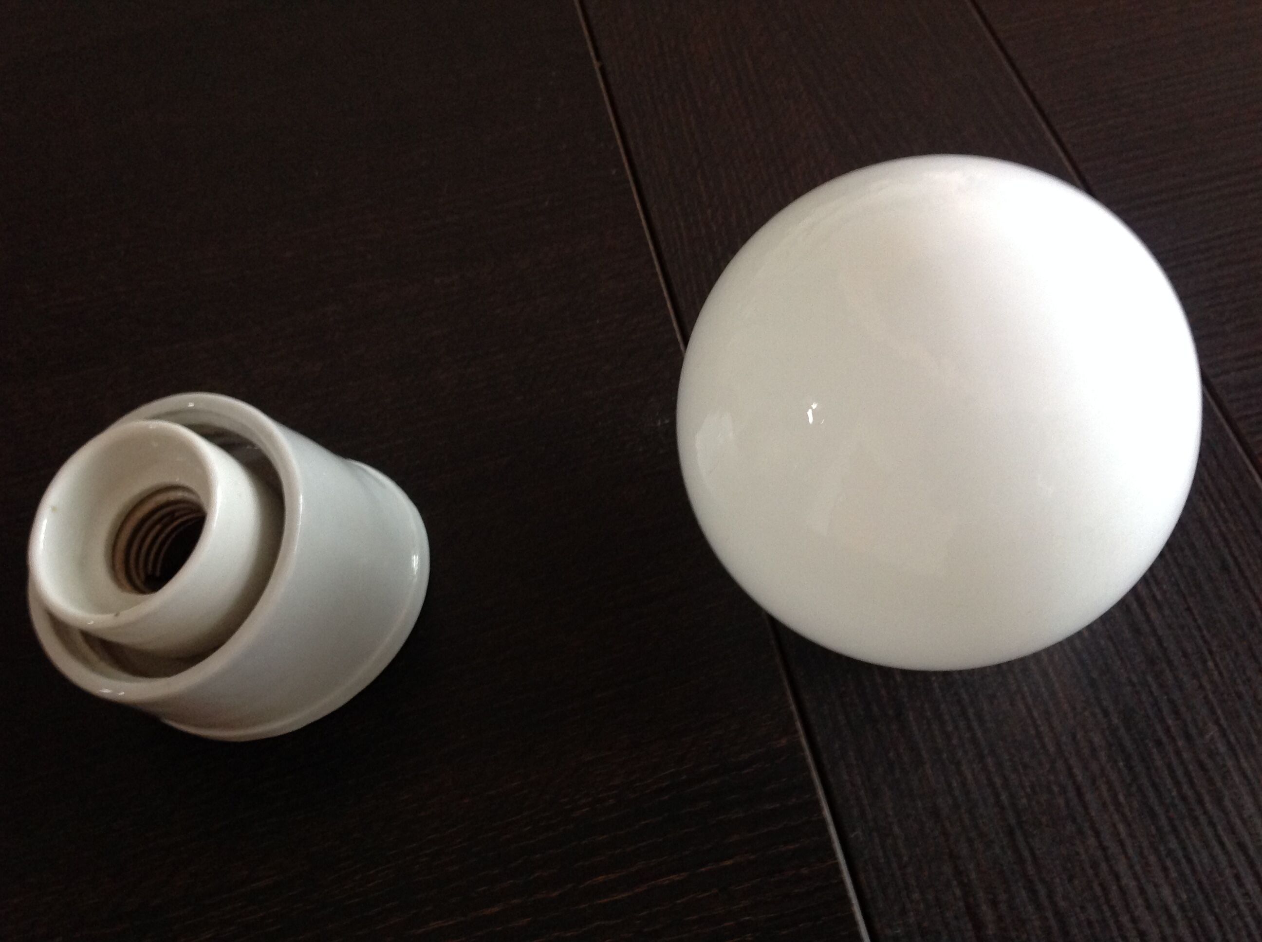 Vintage globe wall lamp in white opaline with white ceramic base