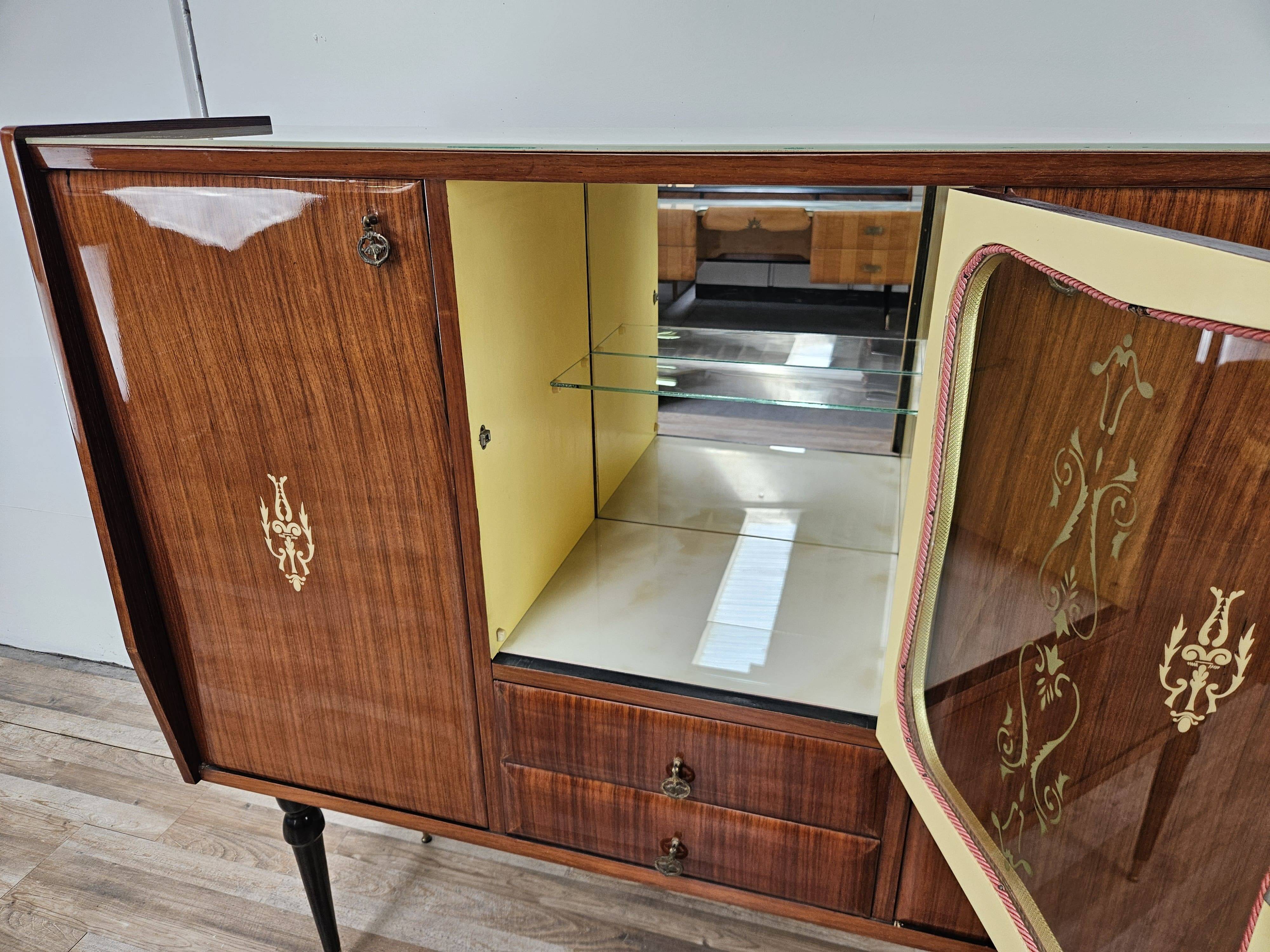 Mid-century 1960s mahogany showcase with glass top
