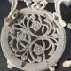 Pair of outdoor chairs in cast aluminum floral decoration