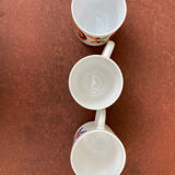 Three Mobil cups