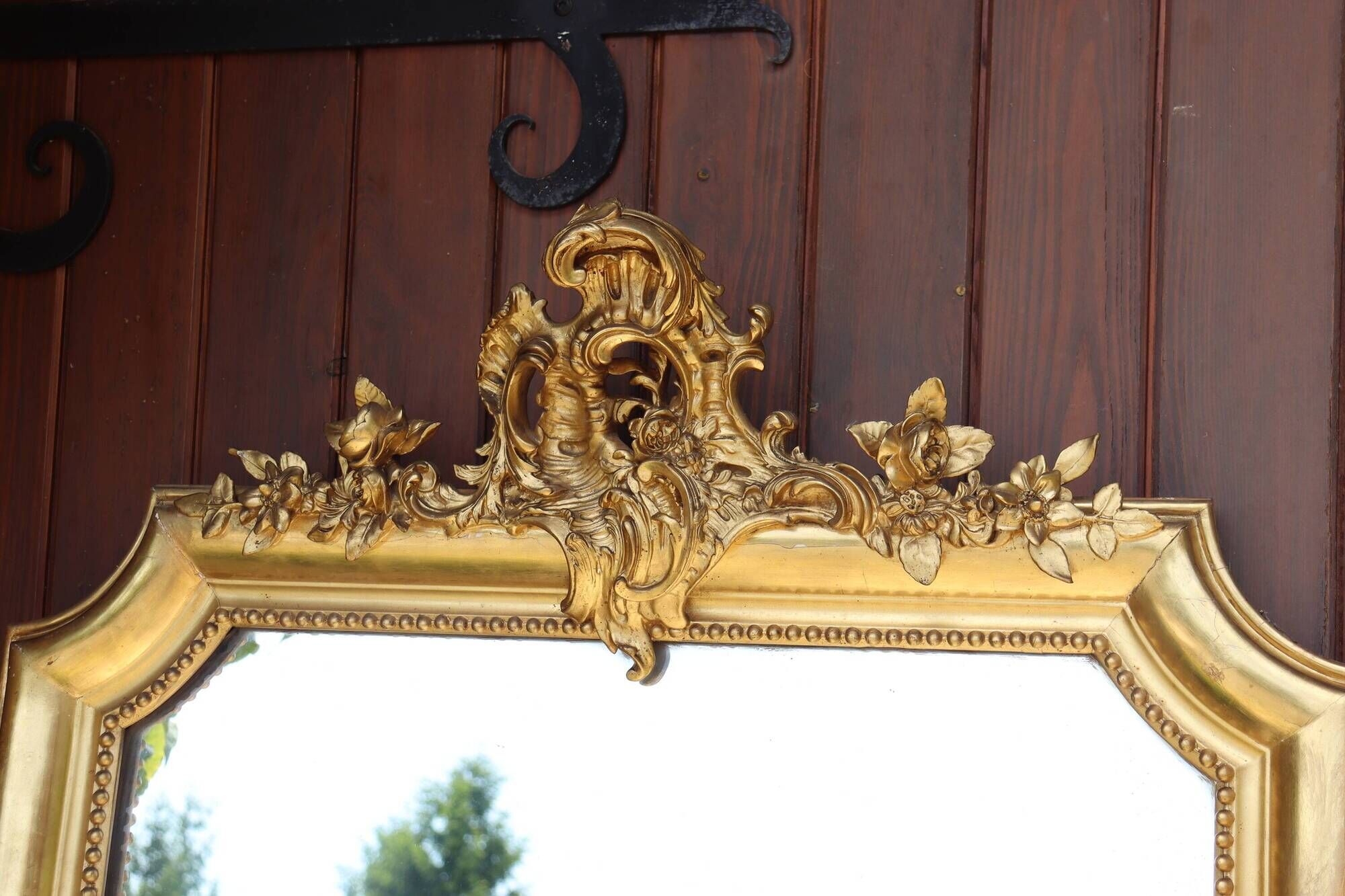 Large gold mirror in Louis XV style
