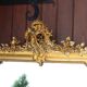 Large gold mirror in Louis XV style