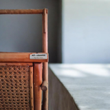 Rattan magazine rack