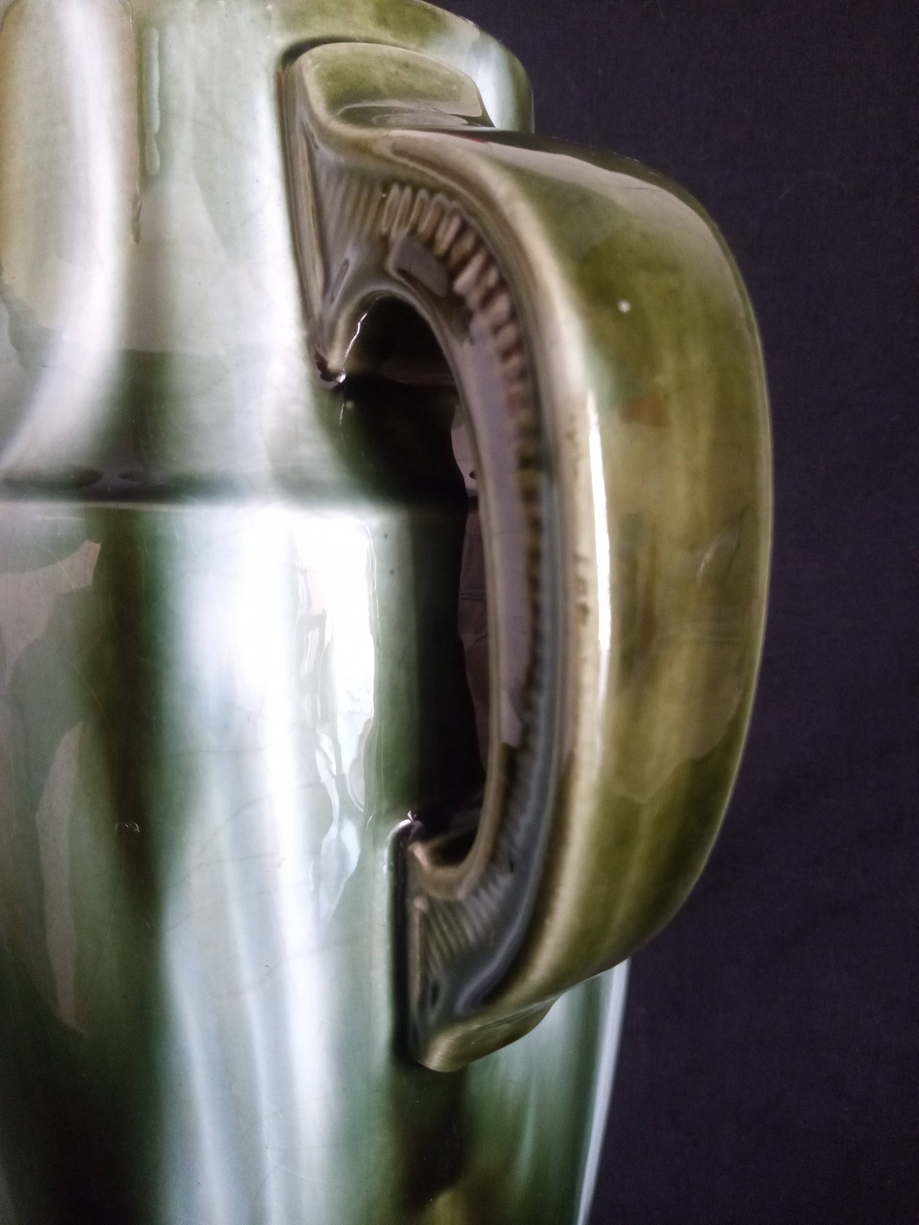 Pair of Art Deco vases in glazed earthenware with white drips on a green background