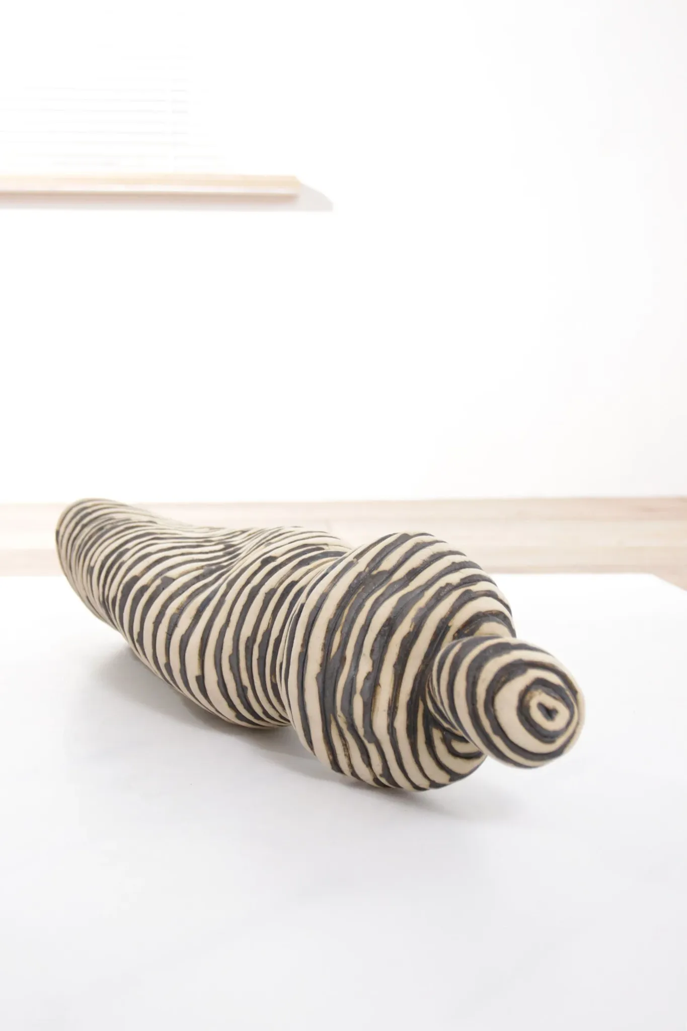 Andrea Dogterom ceramic sculpture women in stripes