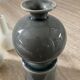 Trio of glazed ceramic vases