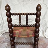Turned wooden chair by Charles Dudouyt