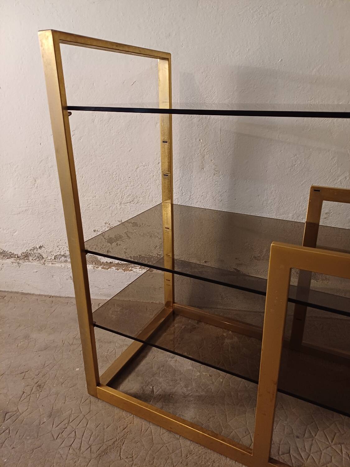 Brass shelf, smoked glass