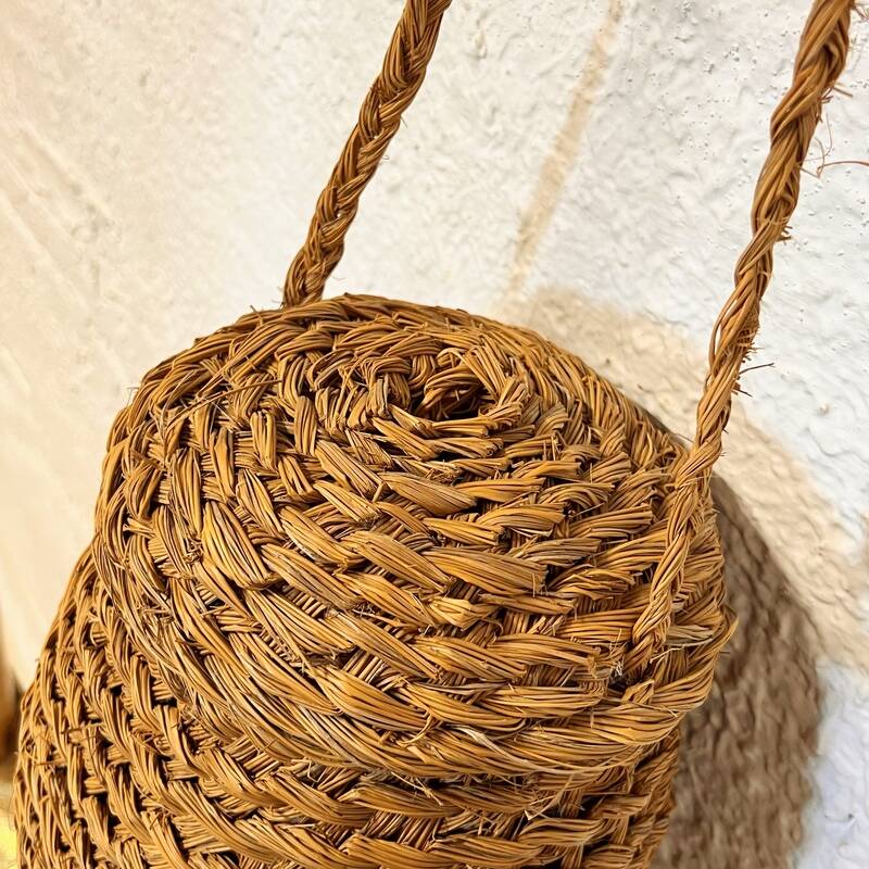 Woven straw basket