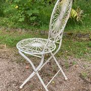 Foldable medallion garden chair from the 20th century in wrought iron with Heart motifs