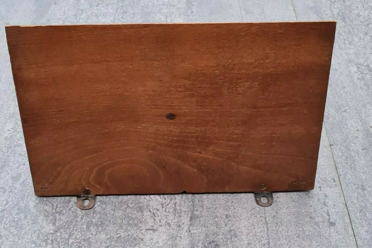 Openwork wooden wall shelf