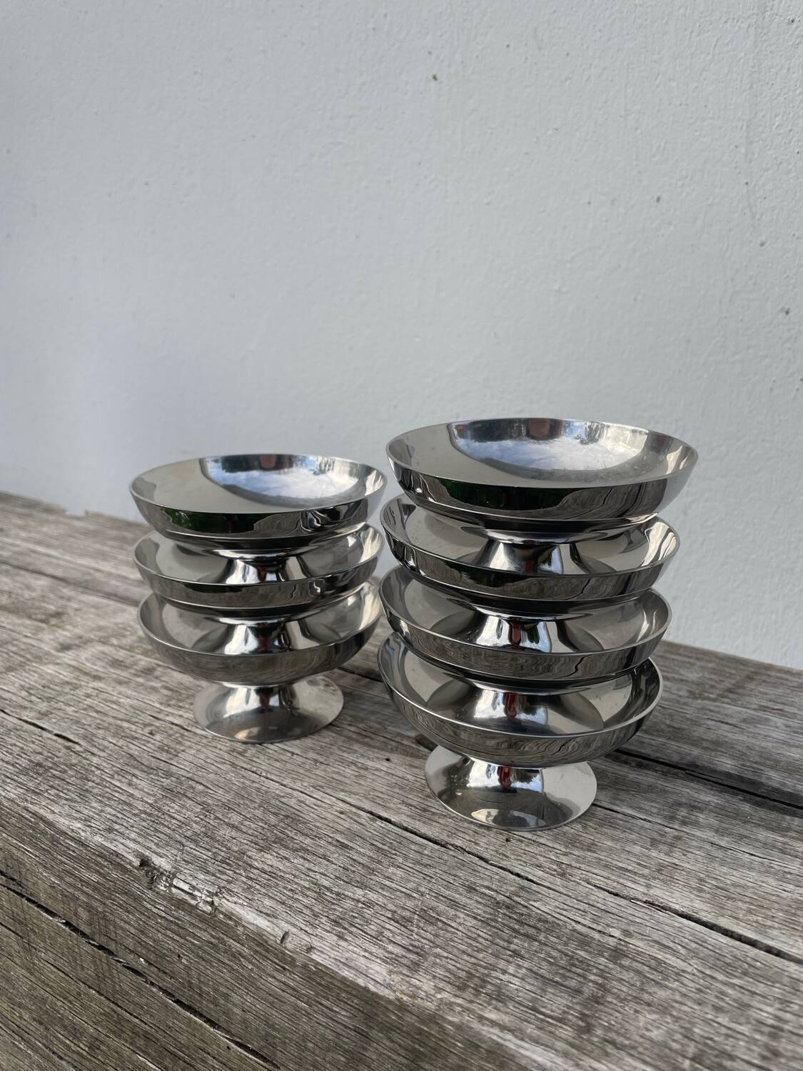 7 stainless steel cups 1970