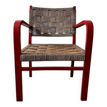 Vintage armchair in red wood and rope