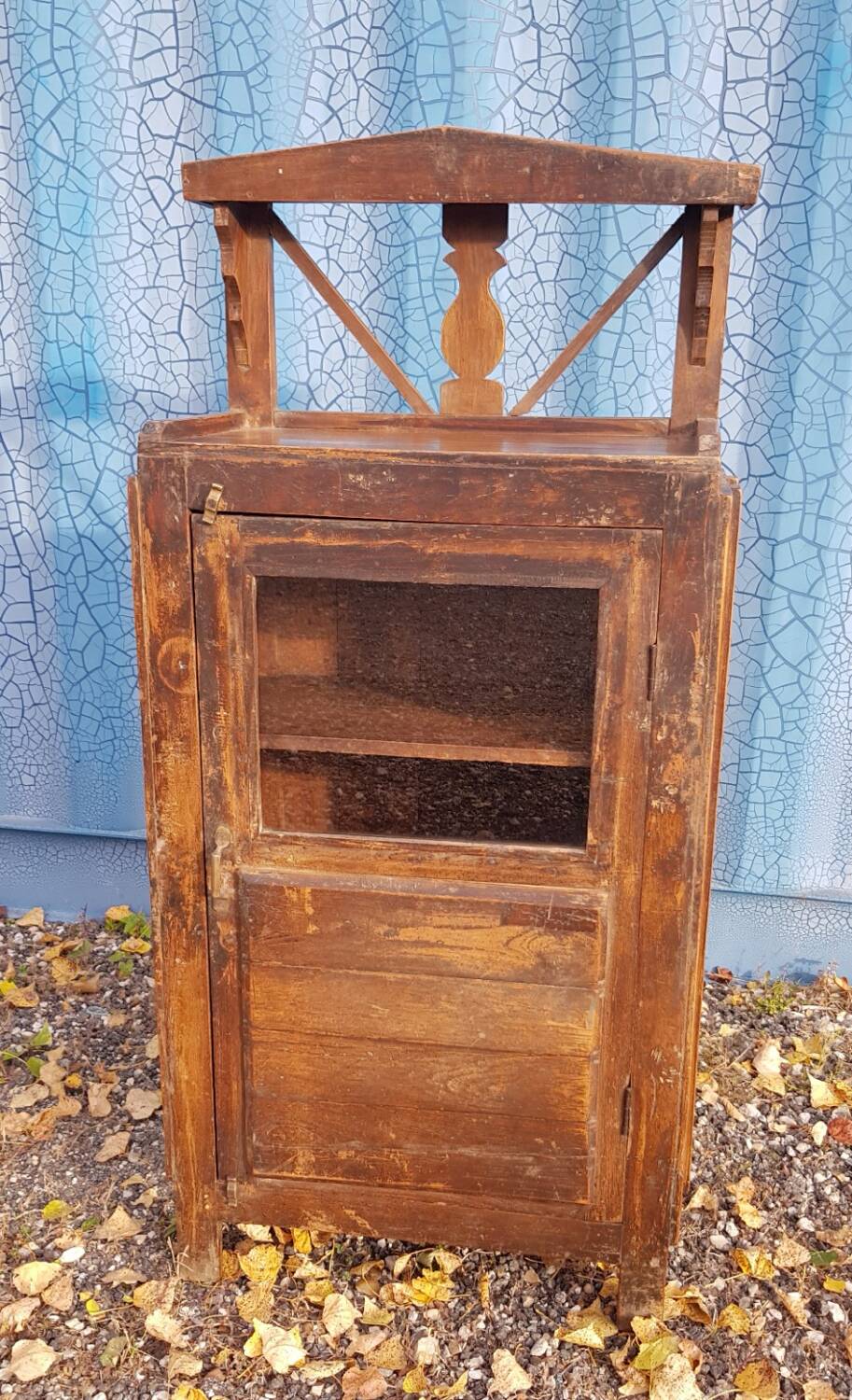 Glass side table in Burmese teak
