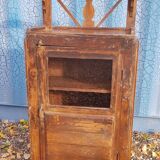 Glass-fronted entrance cabinet in Burmese teak
