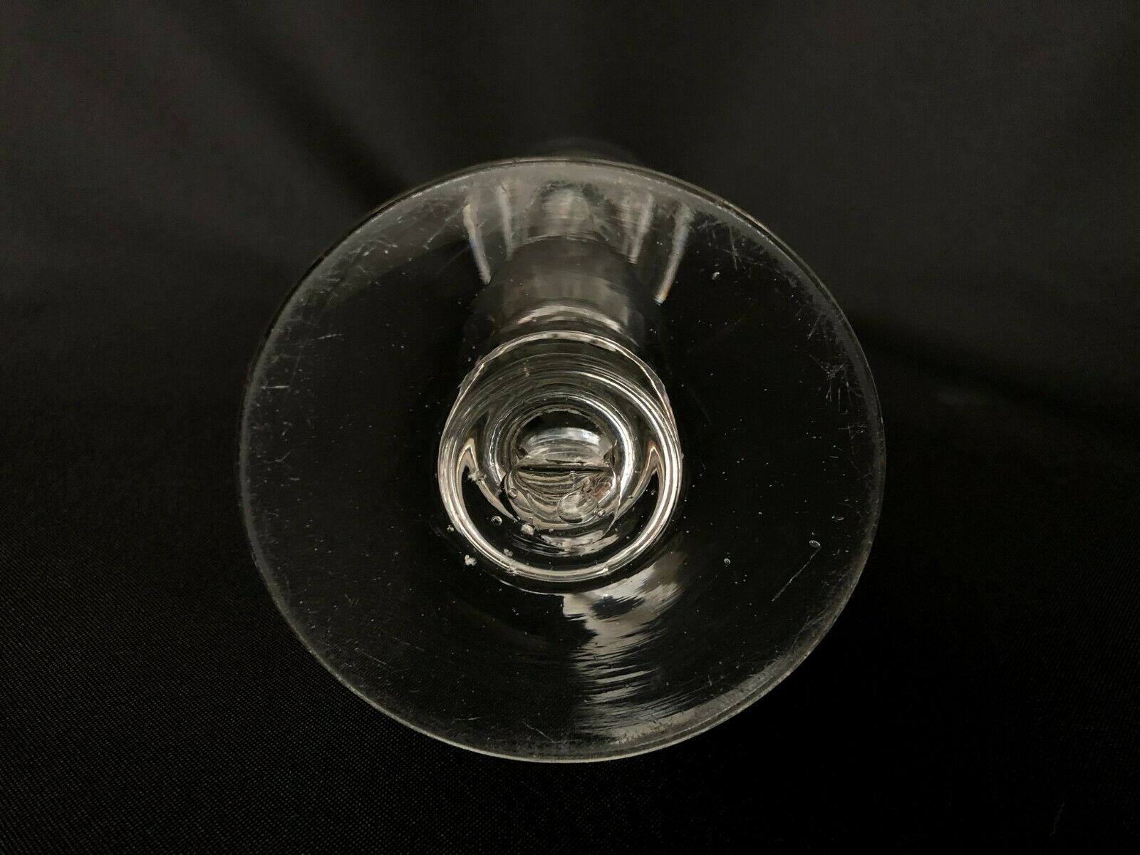 Glass oil lamp blows on foot shower