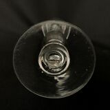 Glass oil lamp blows on foot shower