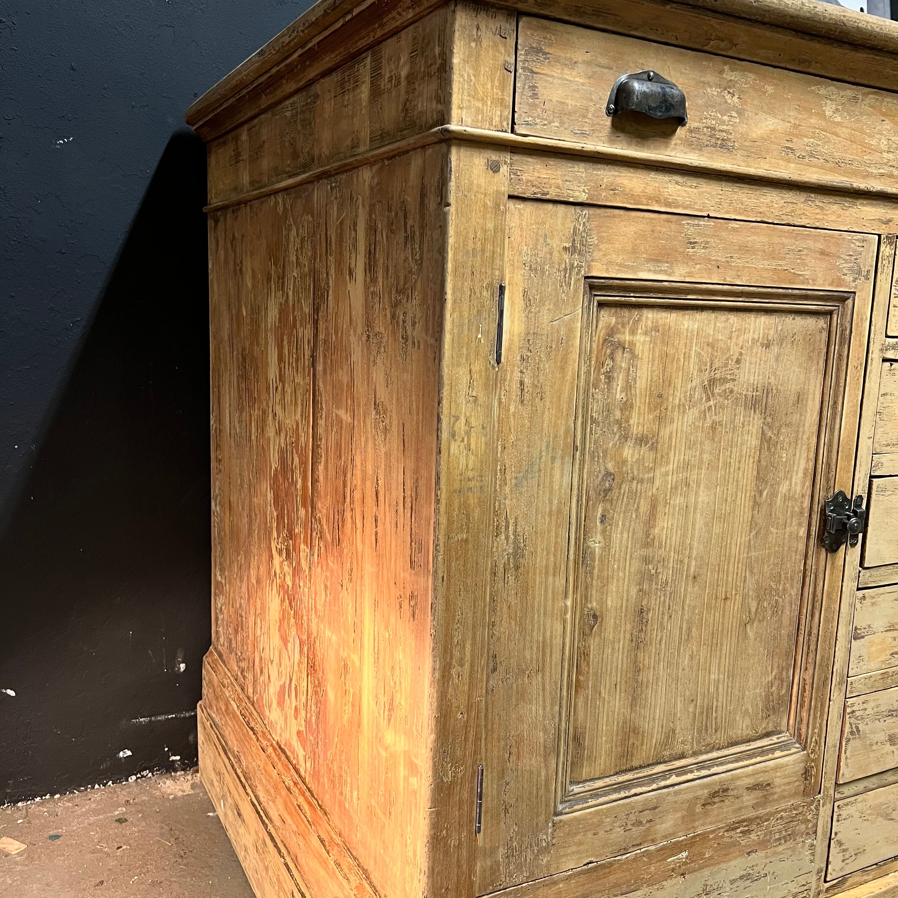 Old piece of furniture by trade with an architect's plan