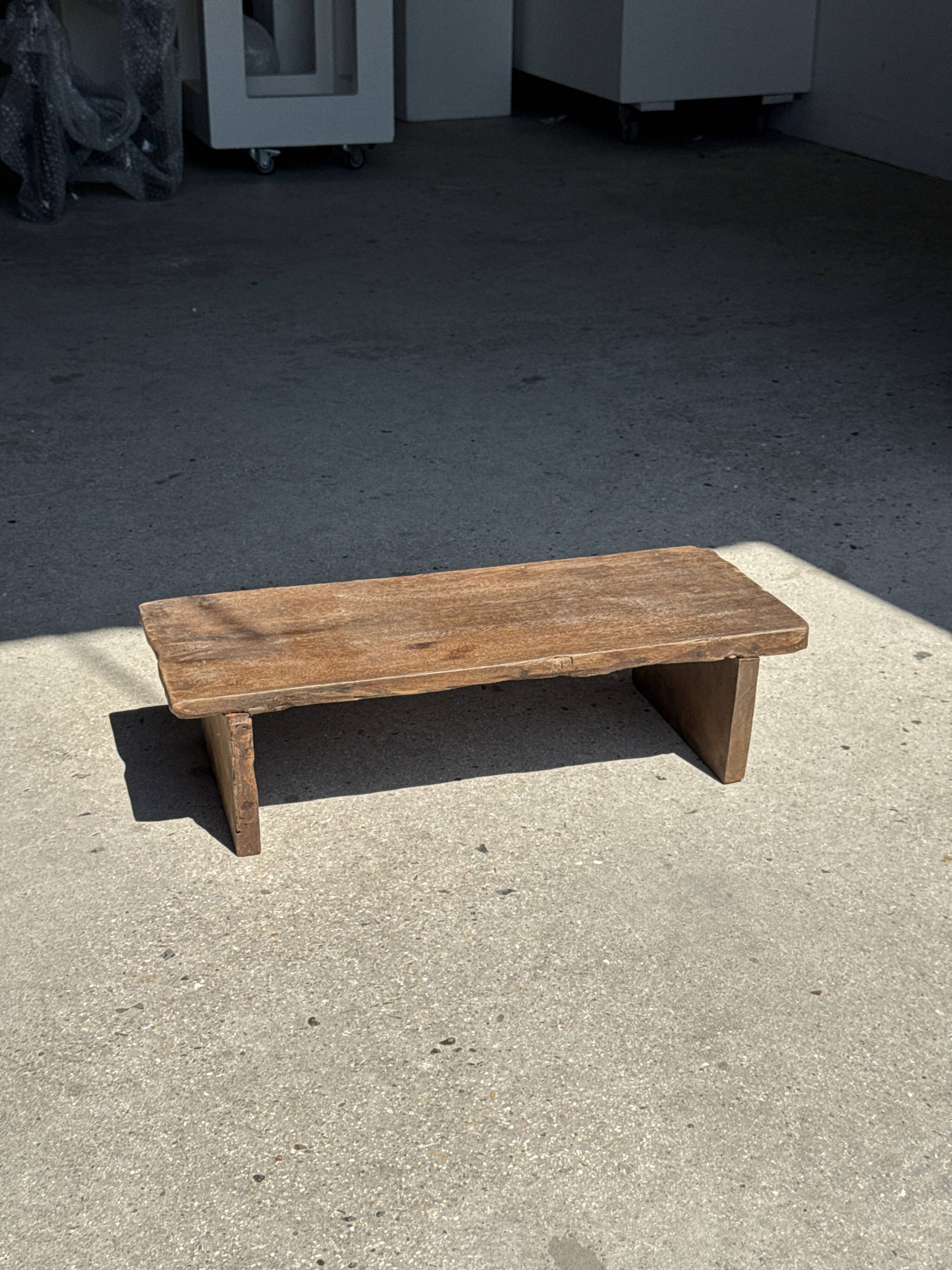 Small low bench in old teak from Indonesia H14 L50