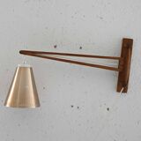 Wooden wall light with adjustable arm