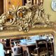 Gold sculpted and moulded stucco trumeau mirror 113 x 78 cm