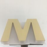 Bright letter M