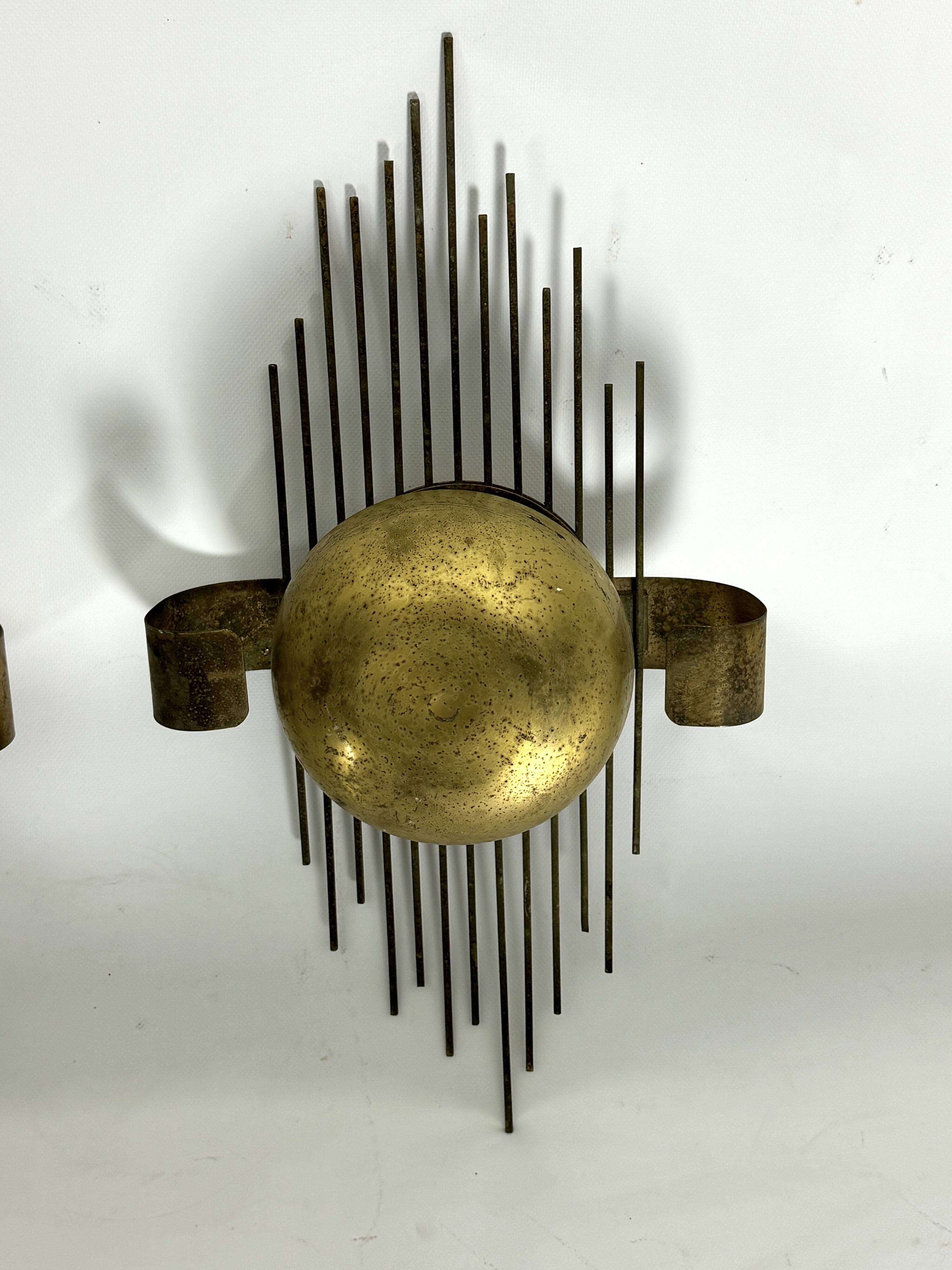 Mid-Century Set of three gilded metal sconces. Italy 1950s