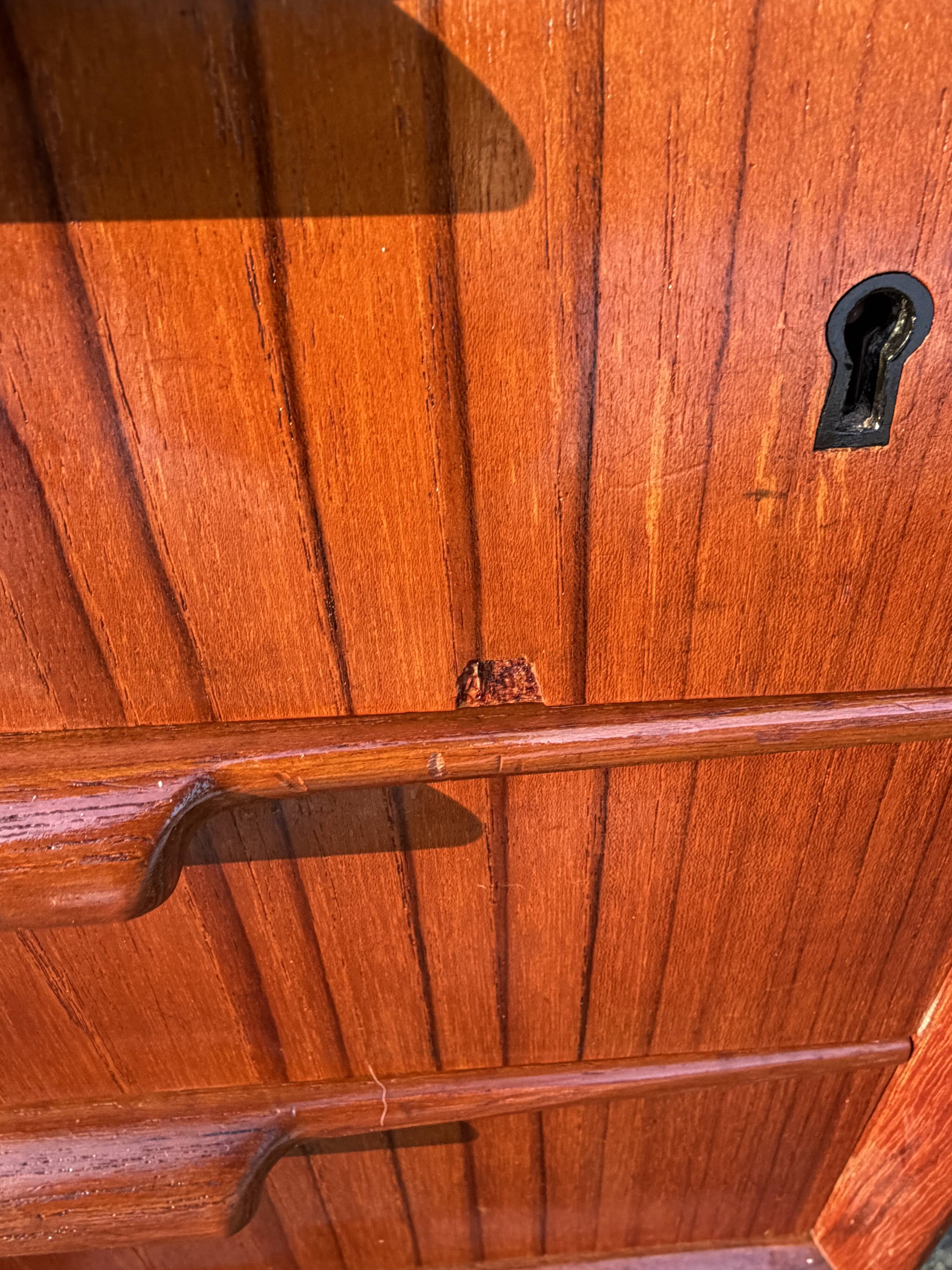 Danish teak desk Gunni Omann no. 75 from the 1960s.